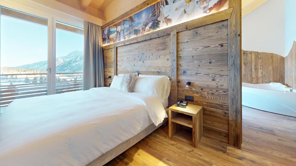 Posteľ alebo postele v izbe v ubytovaní Hotel Gardenia