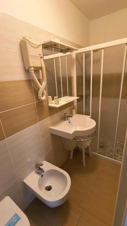 Koupelna v ubytování Hotel Blanchetti