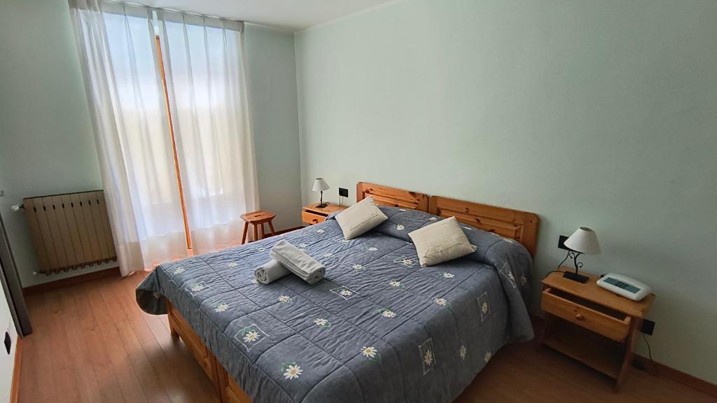 Postel nebo postele na pokoji v ubytování Hotel Blanchetti