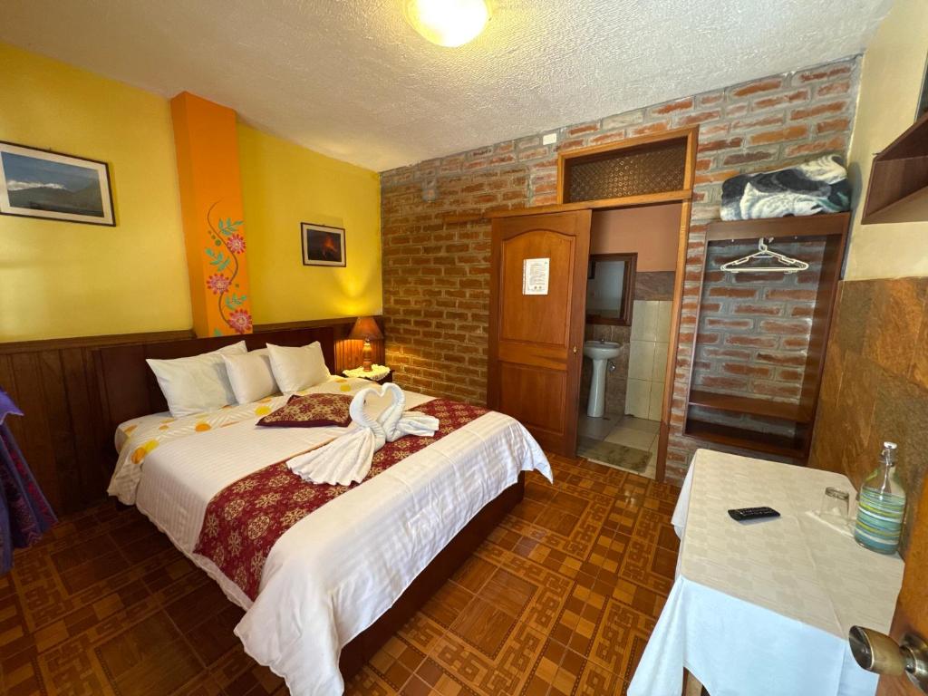 Postel nebo postele na pokoji v ubytování Hotel Donde Ivan