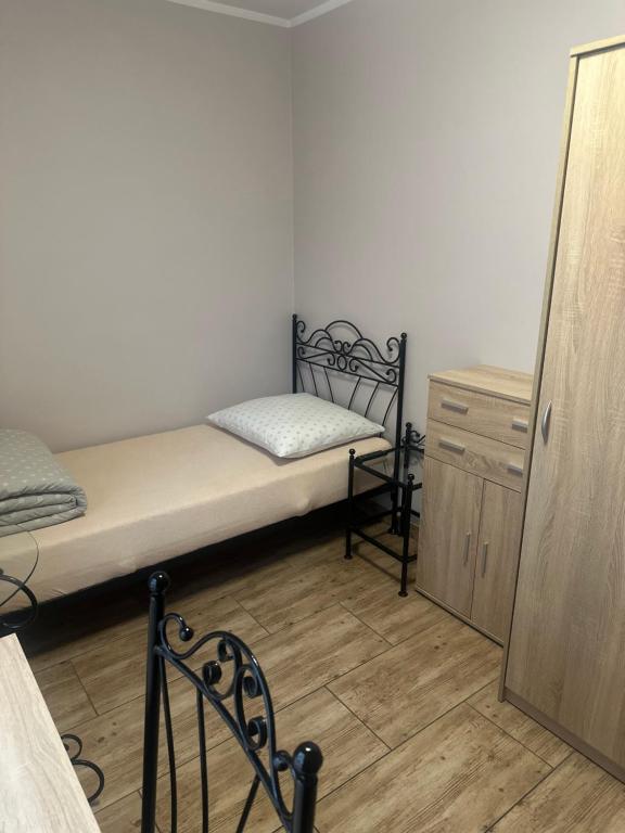 Postel nebo postele na pokoji v ubytování Willa Leszczynko