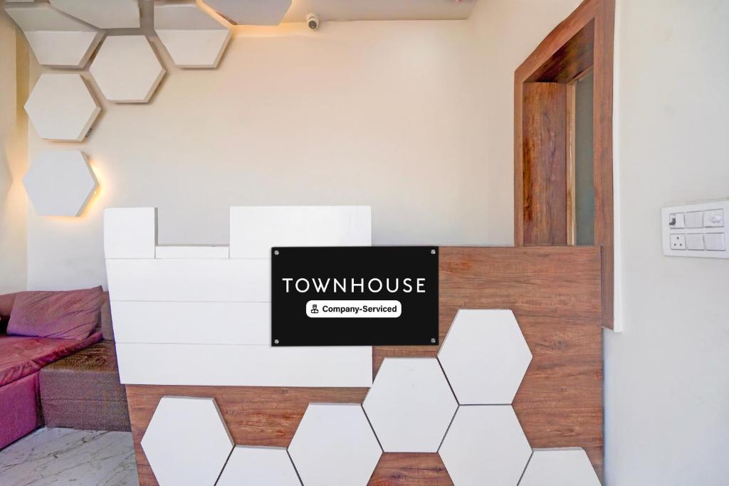 Certifikát, hodnocení, plakát nebo jiný dokument vystavený v ubytování Super Townhouse Govardhan
