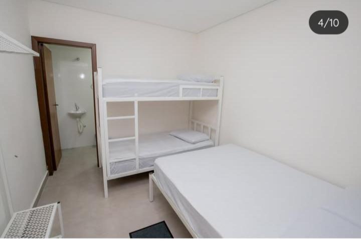 Postel nebo postele na pokoji v ubytování Hotel Paraiso em Valparaíso Goiás