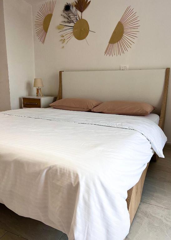 Postel nebo postele na pokoji v ubytování Aloha House