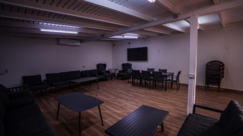 TV a/nebo společenská místnost v ubytování Mano Village