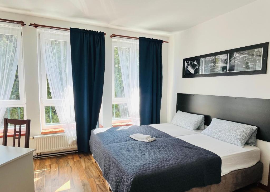 Postel nebo postele na pokoji v ubytování Art HOTEL