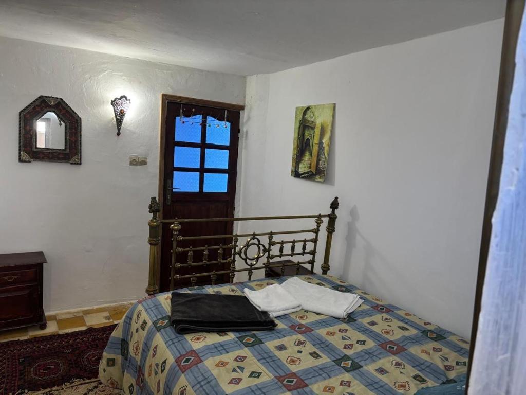 Postel nebo postele na pokoji v ubytování The Medina Riad
