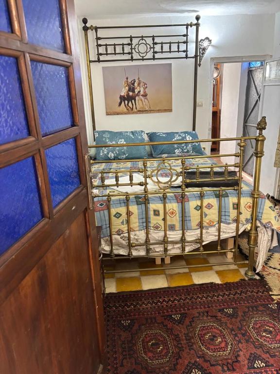 Postel nebo postele na pokoji v ubytování The Medina Riad