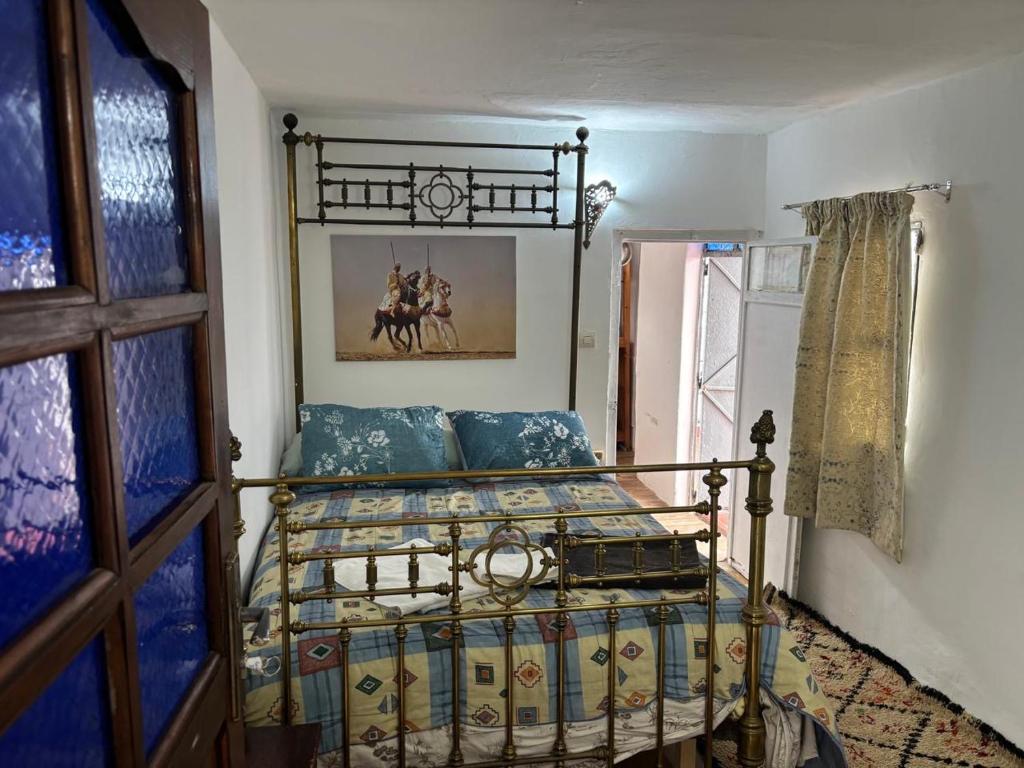 Postel nebo postele na pokoji v ubytování The Medina Riad