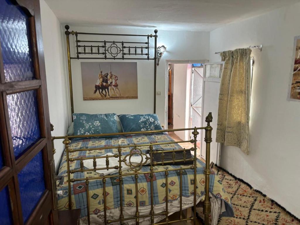 Postel nebo postele na pokoji v ubytování The Medina Riad