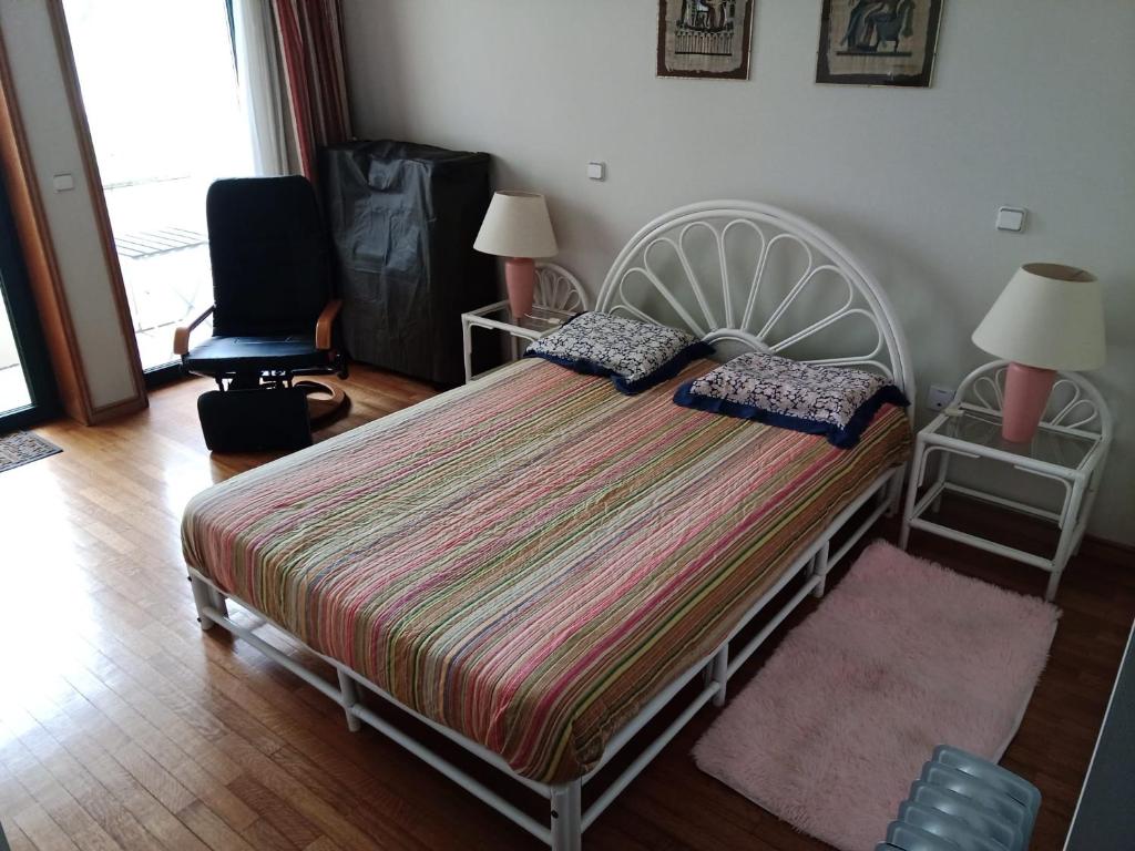 Ένα ή περισσότερα κρεβάτια σε δωμάτιο στο Caminhada Guest Room
