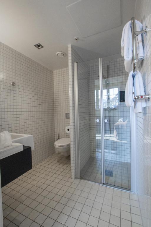 Koupelna v ubytování Home Hotel Havnekontoret
