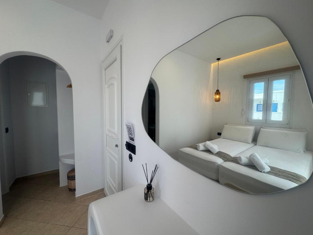 Postel nebo postele na pokoji v ubytování Eleni's Rooms