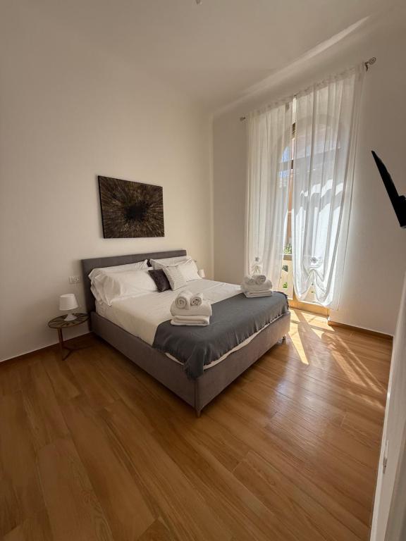 Postel nebo postele na pokoji v ubytování Casa Camilla&Iris