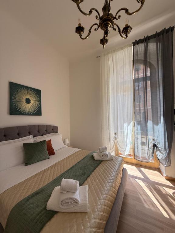 Postel nebo postele na pokoji v ubytování Casa Camilla&Iris