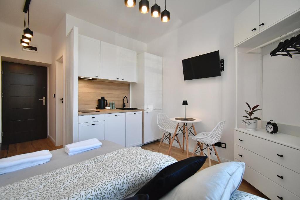 Ένα ή περισσότερα κρεβάτια σε δωμάτιο στο Rental Apartments Dekerta