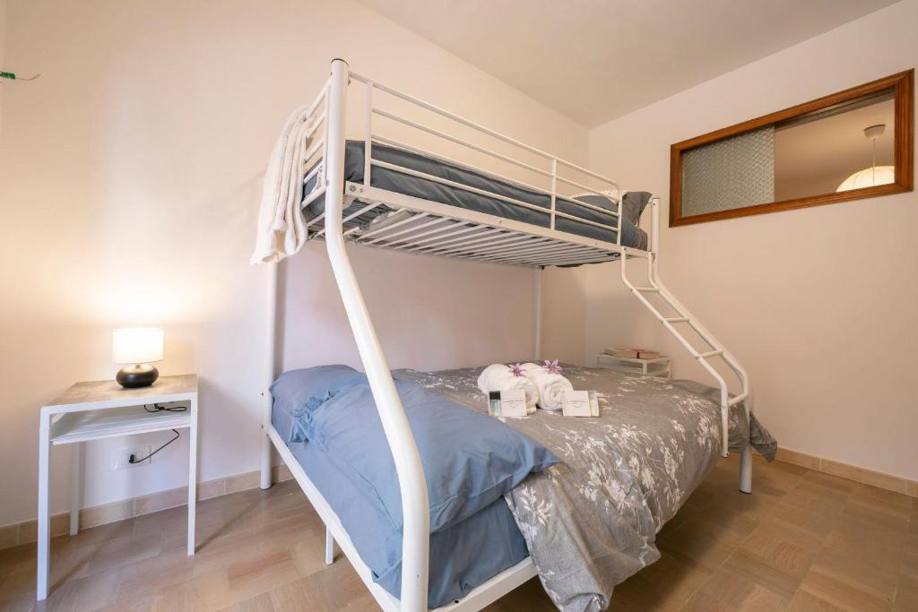 Postel nebo postele na pokoji v ubytování Sicilian Charm close to Taormina - Happy Rentals