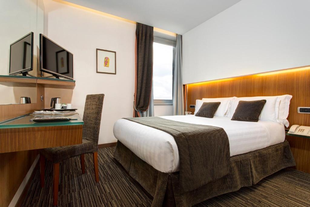 Postel nebo postele na pokoji v ubytování Best Western Plus Hotel Universo