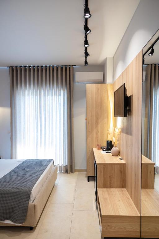 Postel nebo postele na pokoji v ubytování Sofo Hotel Dhermi