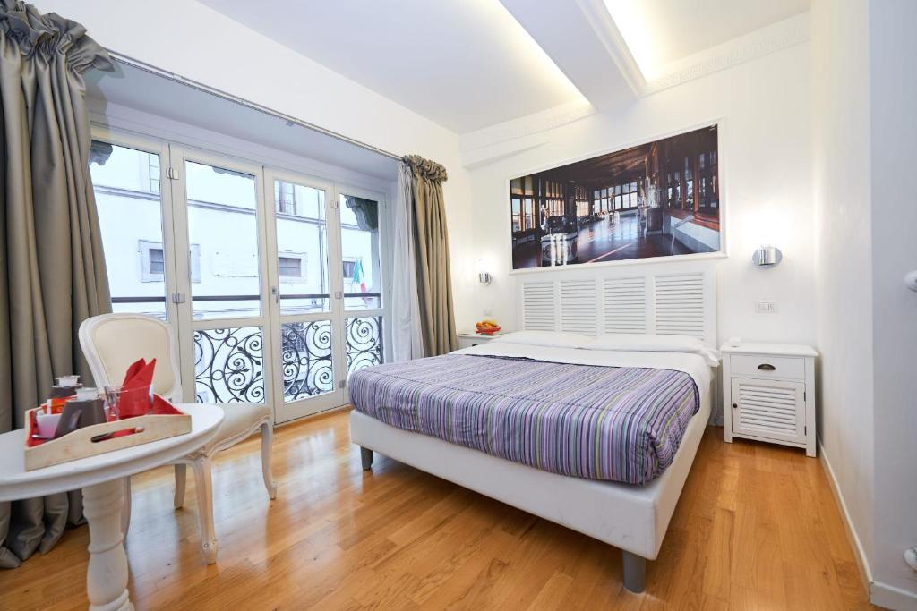 Letto o letti in una camera di B&B Le Stanze del Duomo