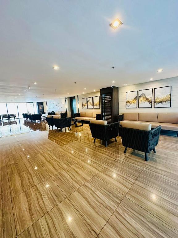 Istumisnurk majutusasutuses E & T Homecations 2 Bedroom Apartment at SMDC Air Residences
