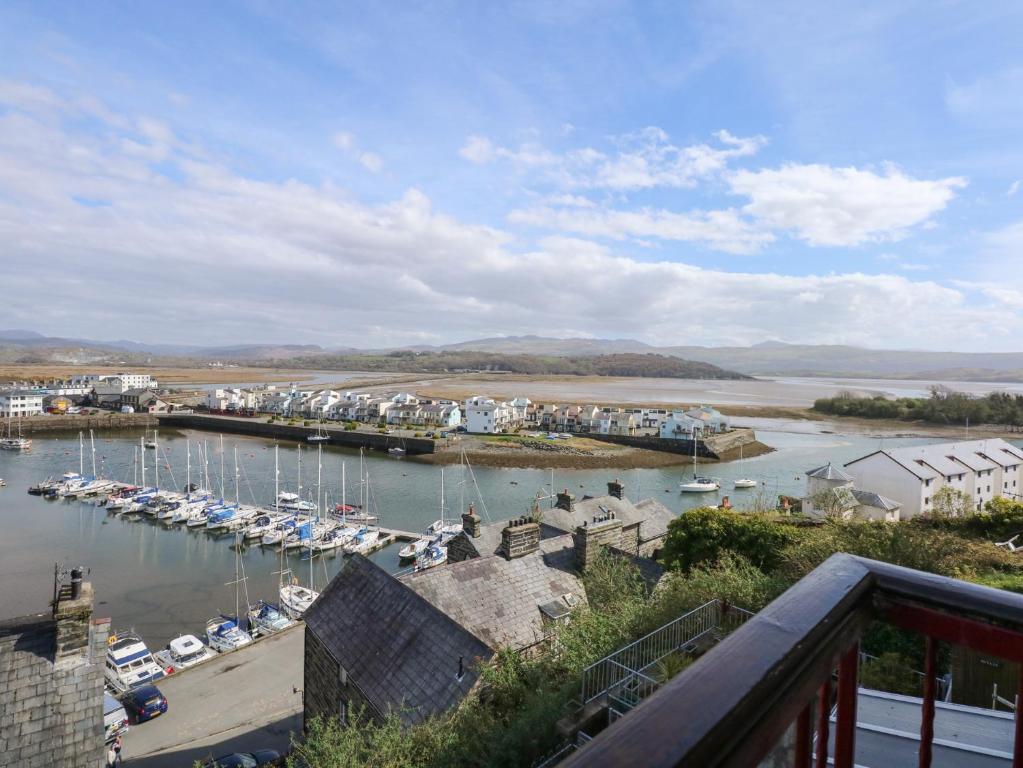 a view of a marina with boats in the water at Captain's Rest in Porthmadog