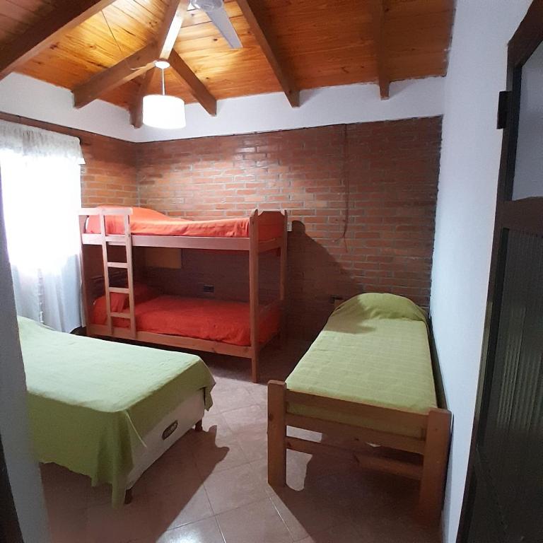 Postel nebo postele na pokoji v ubytování Posada Madre America