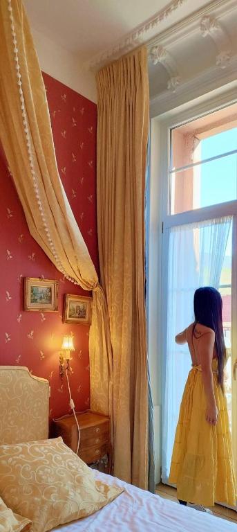 Postel nebo postele na pokoji v ubytování Hôtel Le Manoir