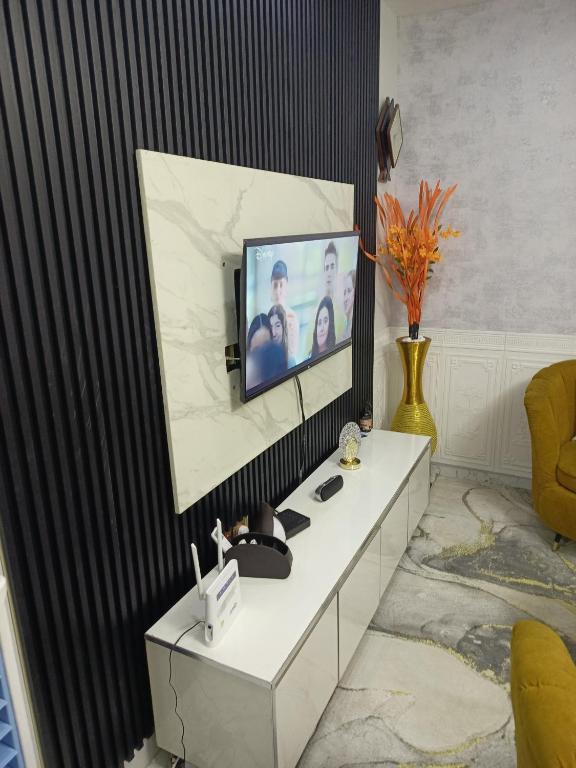 TV a/nebo společenská místnost v ubytování Apartment B16