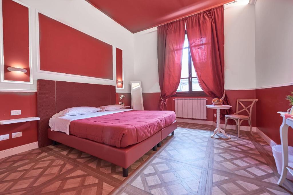 Letto o letti in una camera di B&B Le Stanze del Duomo