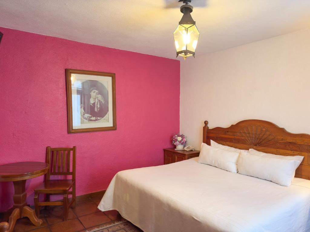 Postel nebo postele na pokoji v ubytování Hotel Casa del Refugio