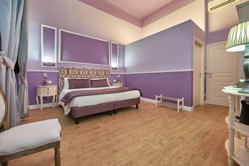 Letto o letti in una camera di B&B Le Stanze del Duomo