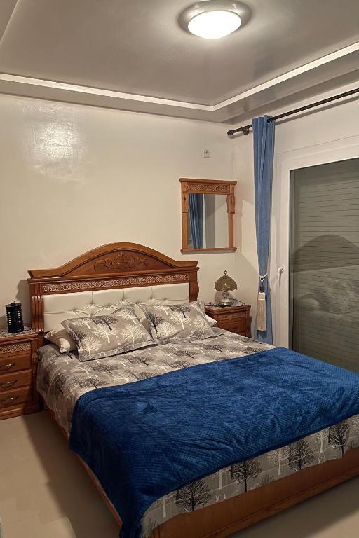Postel nebo postele na pokoji v ubytování appartement vue sur mer saidia