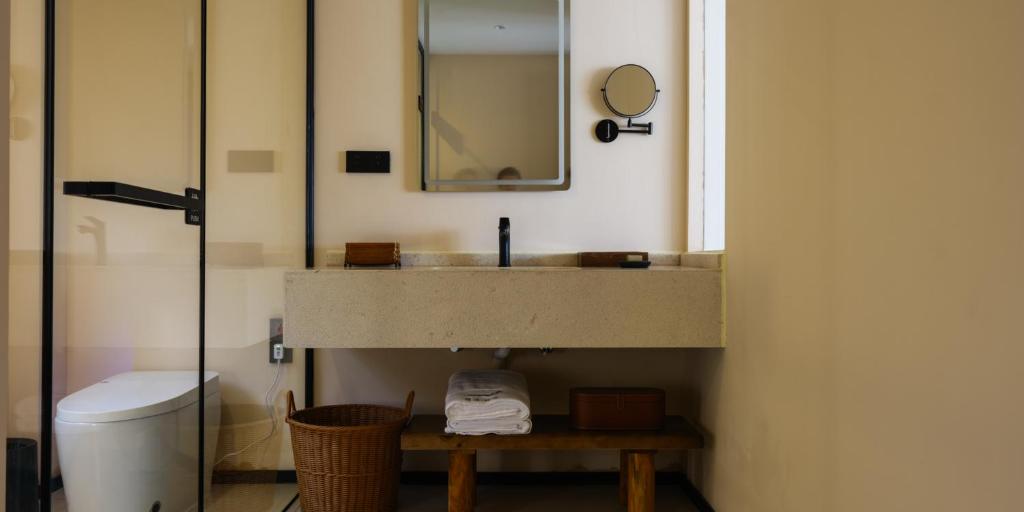 Koupelna v ubytování Huangshan Yixian Pumanmanju Hotel