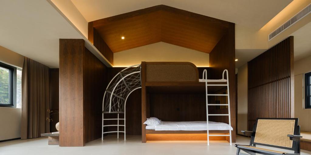 Postel nebo postele na pokoji v ubytování Huangshan Yixian Pumanmanju Hotel