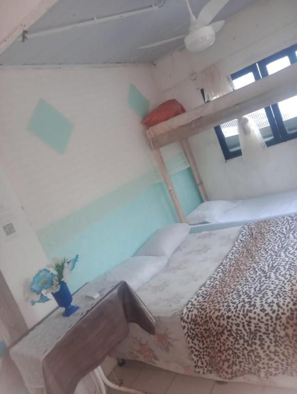 Postel nebo postele na pokoji v ubytování Suites com Wi-fi em Itajai