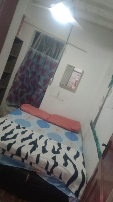 Postel nebo postele na pokoji v ubytování Suites com Wi-fi em Itajai