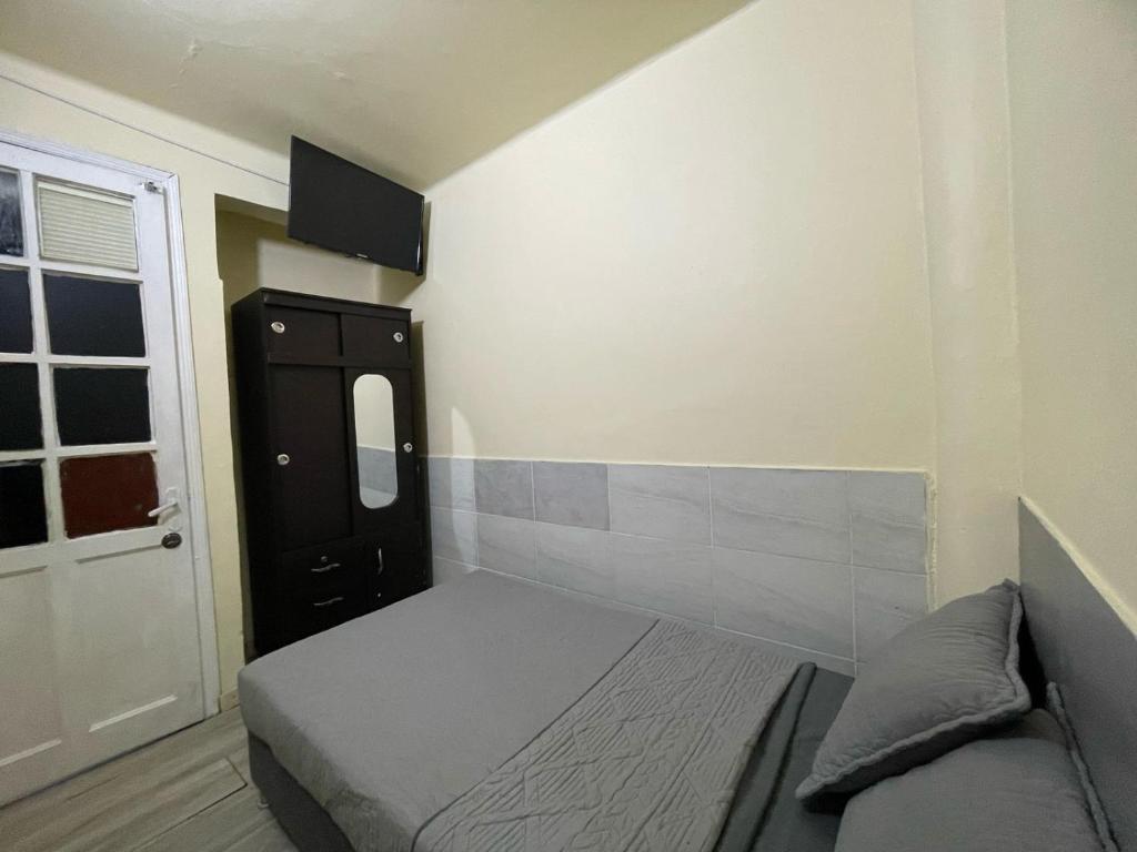 Postel nebo postele na pokoji v ubytování Hostel Quinta Camacho