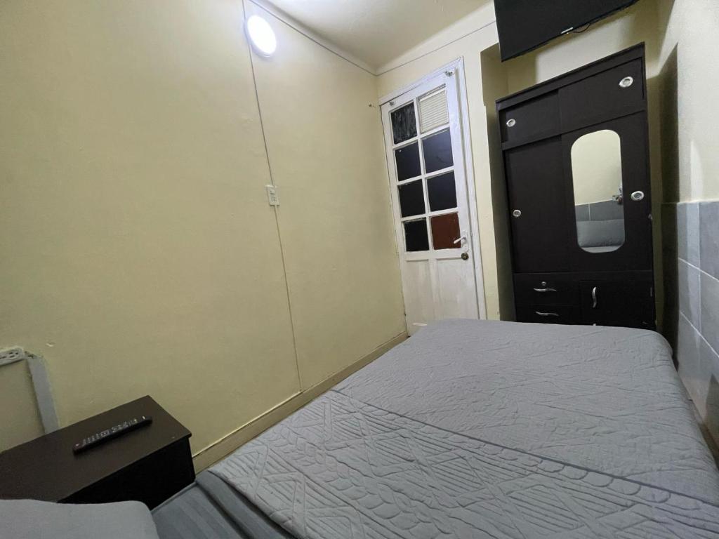 Postel nebo postele na pokoji v ubytování Hostel Quinta Camacho