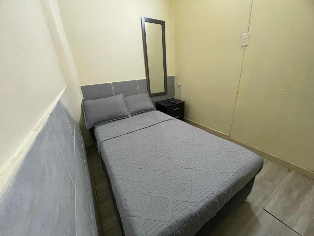 Postel nebo postele na pokoji v ubytování Hostel Quinta Camacho