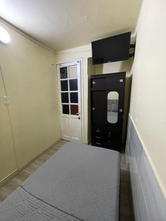 Postel nebo postele na pokoji v ubytování Hostel Quinta Camacho