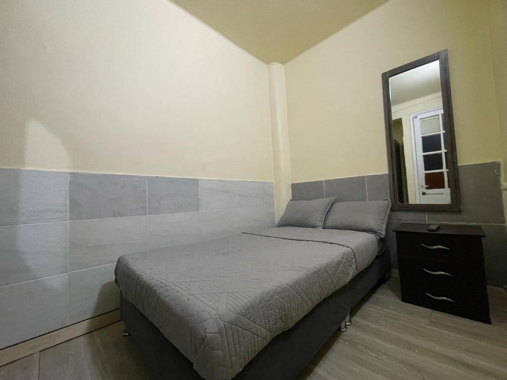 Postel nebo postele na pokoji v ubytování Hostel Quinta Camacho