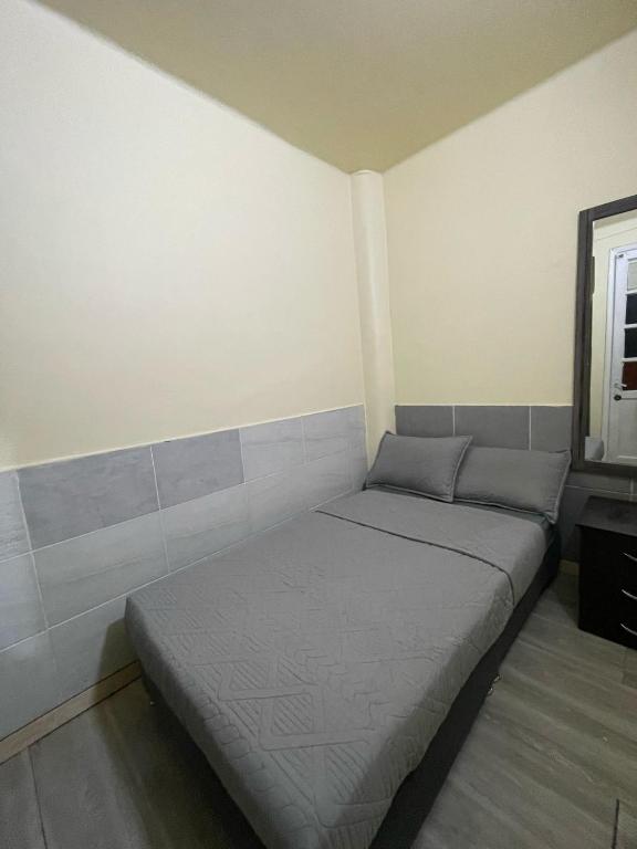 Postel nebo postele na pokoji v ubytování Hostel Quinta Camacho