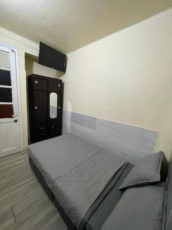 Postel nebo postele na pokoji v ubytování Hostel Quinta Camacho