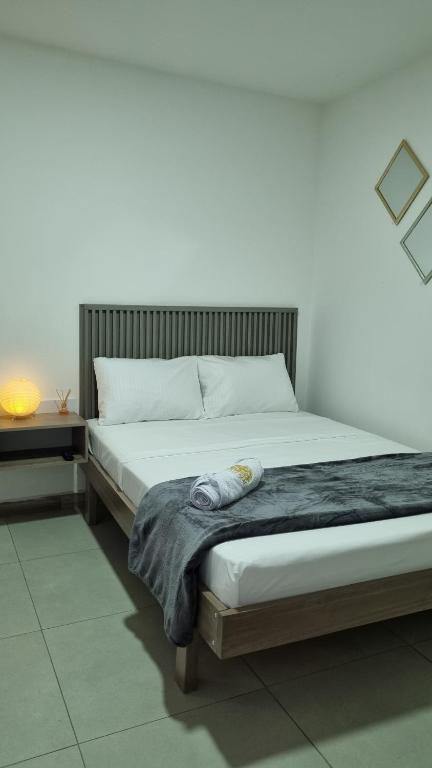 Postel nebo postele na pokoji v ubytování Hotel Fuente Real Popayán