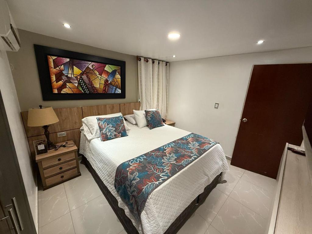 Postel nebo postele na pokoji v ubytování Hotel Ucla Center