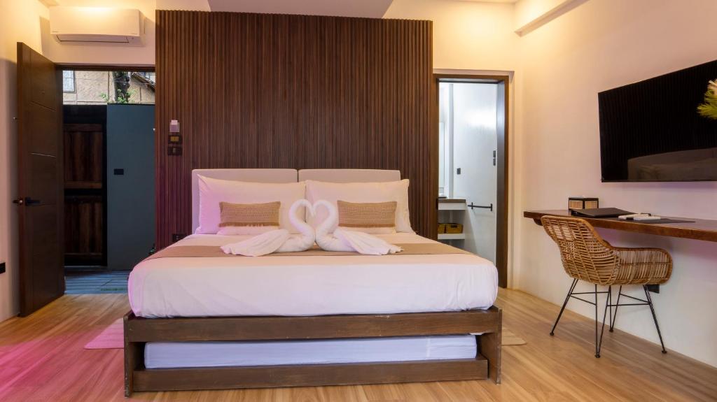 Postel nebo postele na pokoji v ubytování Capricho Villa El Nido