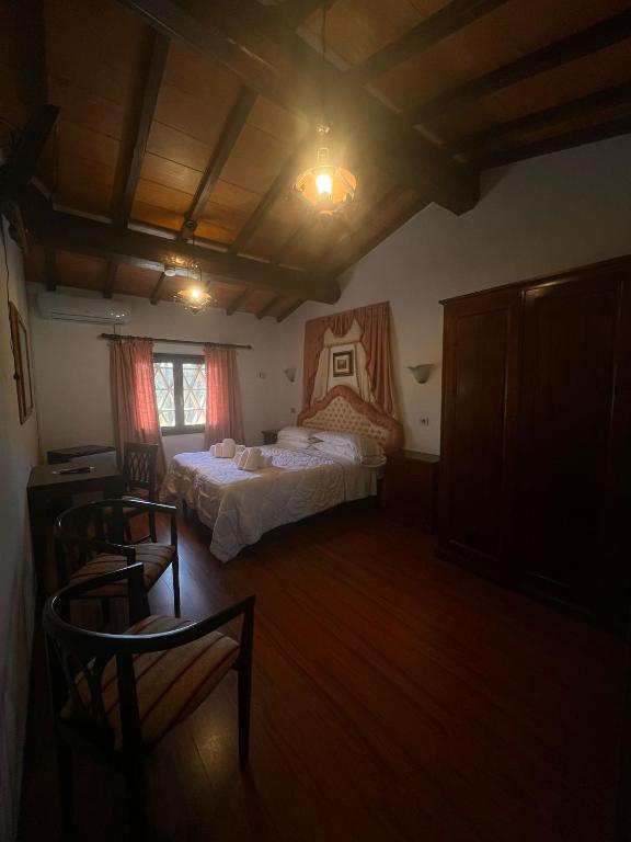 Postel nebo postele na pokoji v ubytování Hotel Il Pietreto