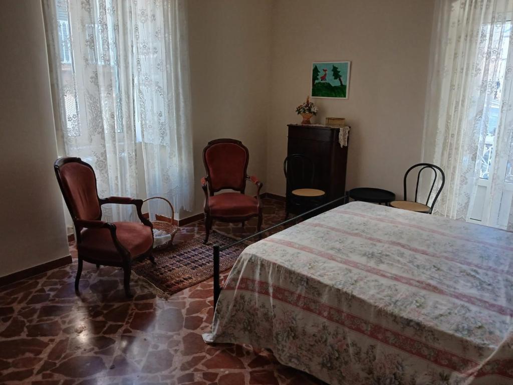 Postel nebo postele na pokoji v ubytování Palazzo delle favole