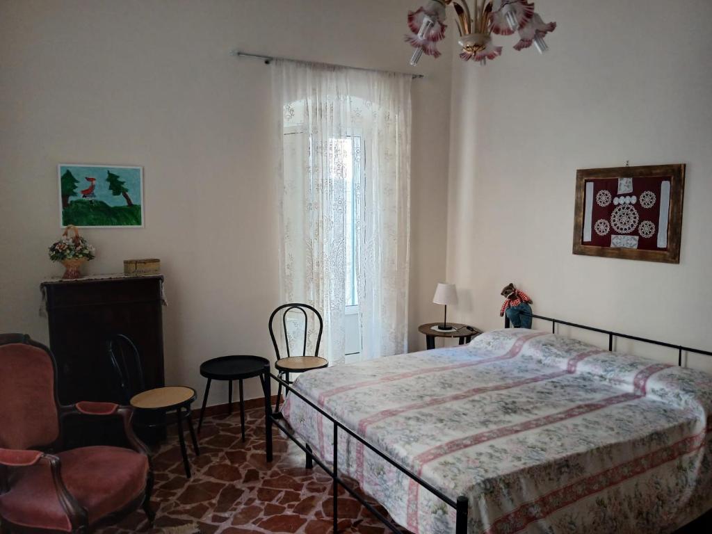 Postel nebo postele na pokoji v ubytování Palazzo delle favole